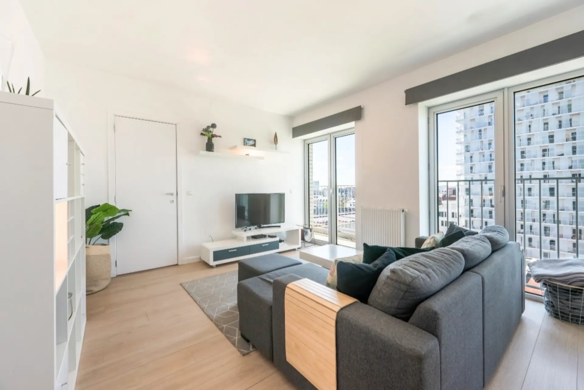 Furnished living room with panoramic tower views